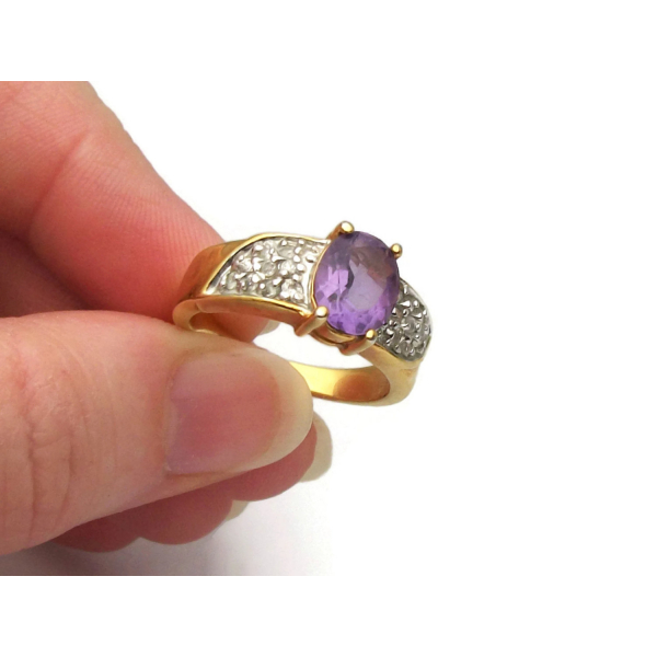 Vintage 8 3/4 faux amethyst ring with silver and gold band clear rhinestones