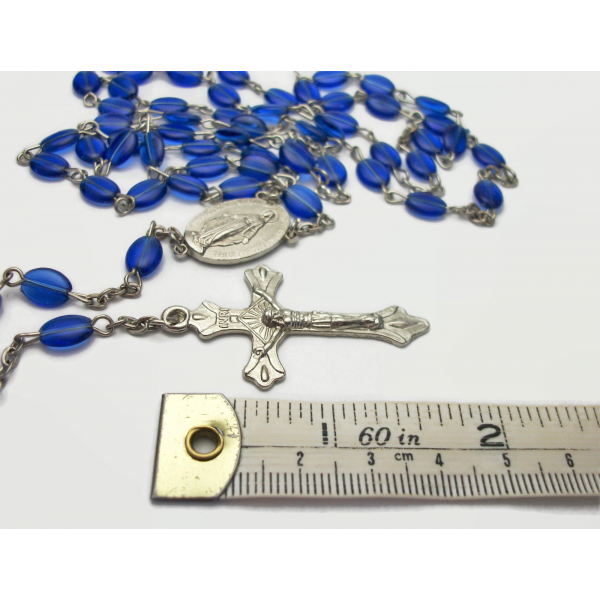 Silver and blue rosary prayer beads with Virgin Mary centerpiece