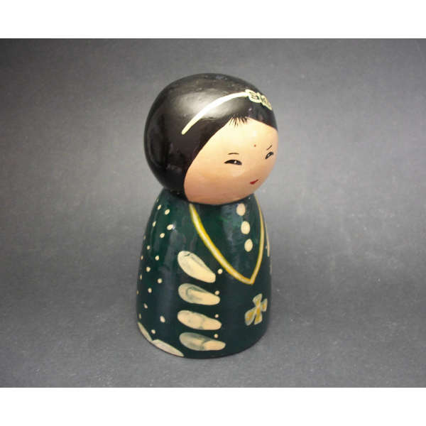 Green Kokeshi doll