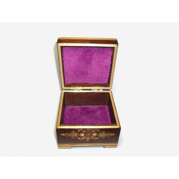 Inside purple lining of Russian wood inlay trinket box