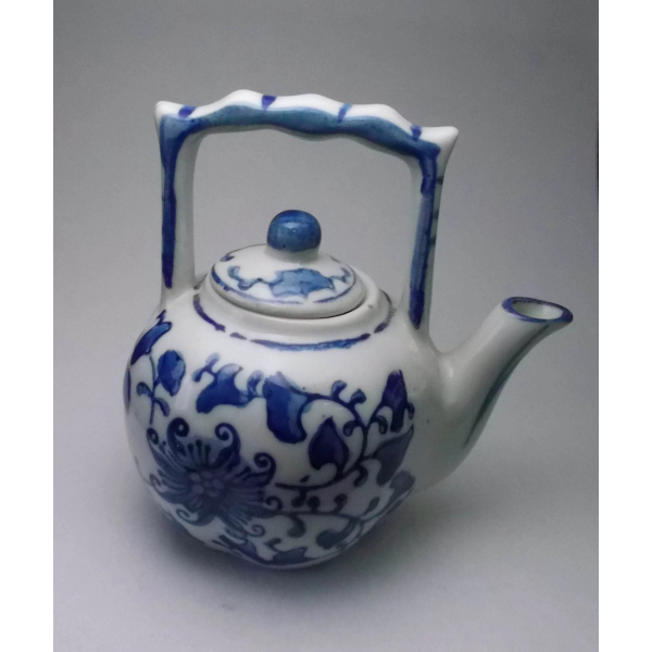 Blue and white miniature floral porcelain teapot