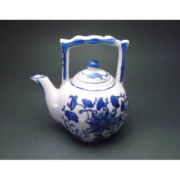 Miniature blue and white floral porcelain teapot