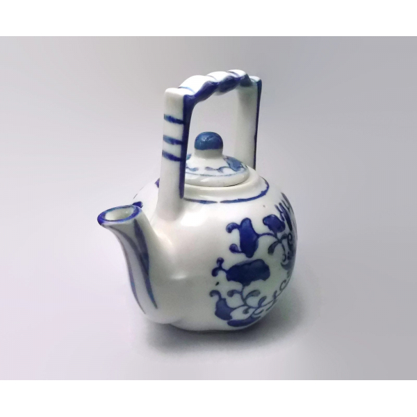 Front of miniature porcelain teapot