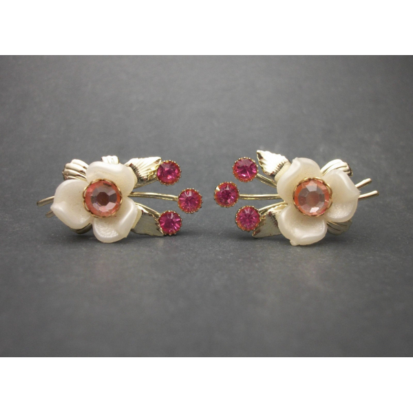 Celluloid floral clip on earrings white and pink on dark background