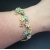 Vintage Pastel Enamel Flower Bracelet with Rhinestone Accents Gold Leaves Floral Size 7 Inches Long Pink Blue Yellow Green Vintage Pastel Enamel Flower Bracelet with Rhinestones Size 7 Women's