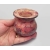 Hand holding small stoneware vaseto show size
