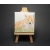 Fox drawing on miniature canvas with easel