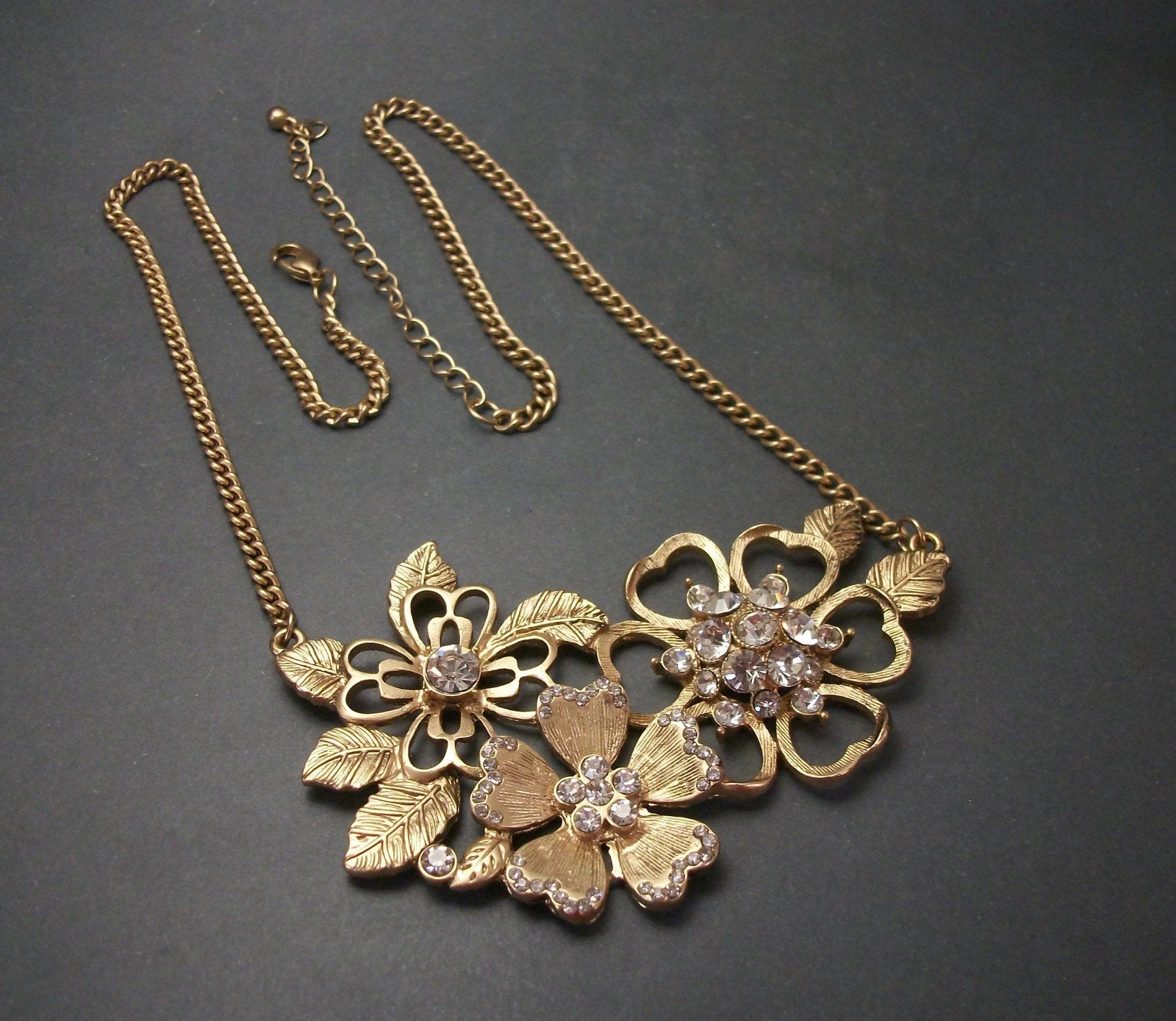Gold Tone Flower Bib Necklace with Crystals Adjustable Length Gold Tone Flower Bib Necklace with Crystals Adjustable Length