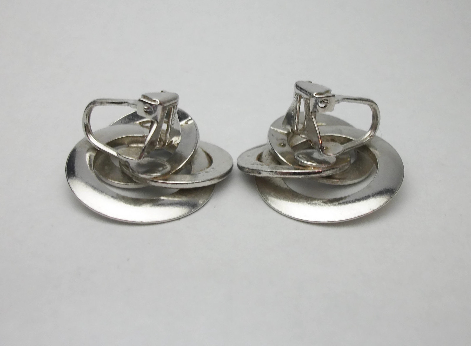 View of Vintage 1950s Signed Coro Silver Tone Entwined Circles Clip on Earrings ...