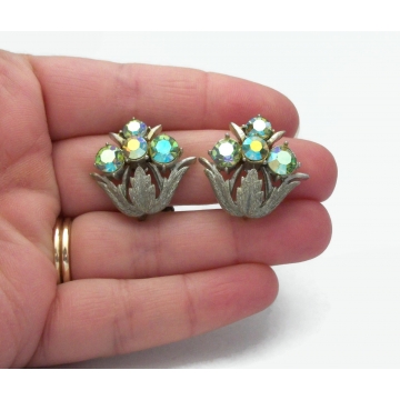Vintage Signed Coro Textured Silver and Green AB Crystal Floral Clip on Earrings Green Aurora Borealis Crystal Rhinestones Mid Century